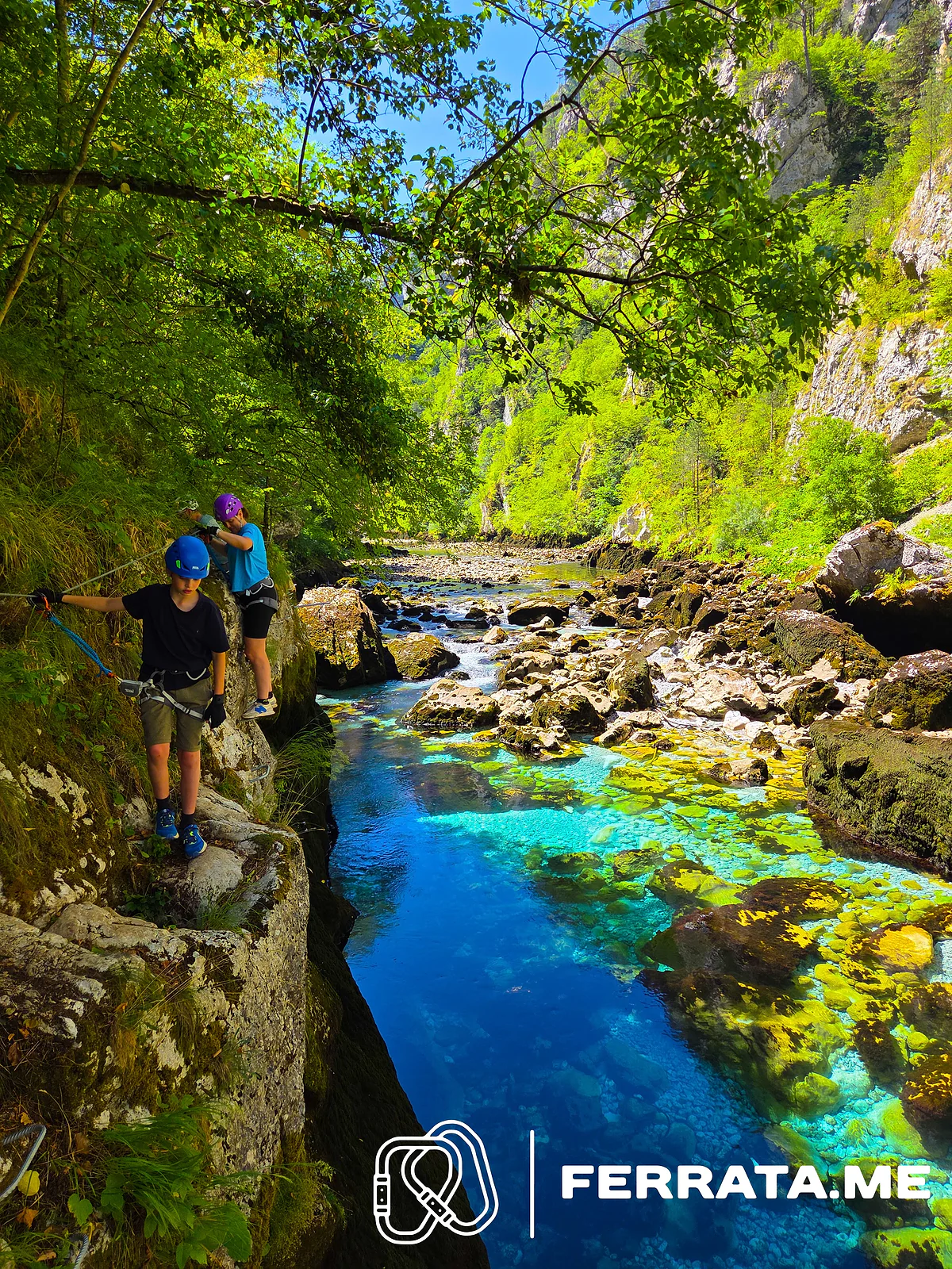 Climbers on the traverse above a deep blue pool.